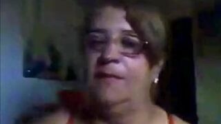 Brazilian granny shows her tits