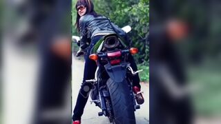 Naked girl on motorcycle