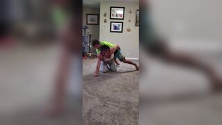 Sister Brother Wrestling Hard on the Floor